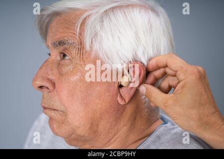 Hören Sie Probleme Mit Behinderungen. Unterstützende Audiologie Stockfoto