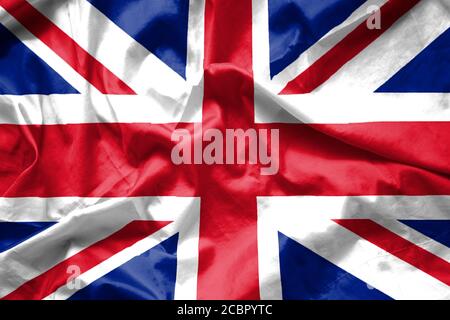 Britische Flagge Hintergrund winken mit Stoff Textur, Union Jack. Stockfoto