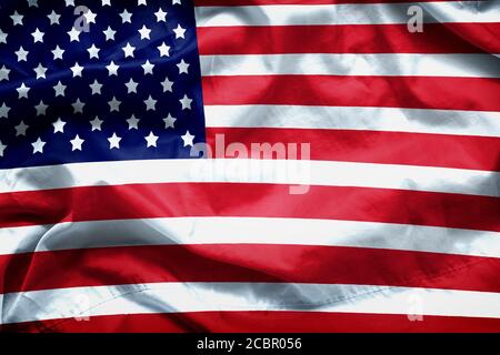 Hintergrund der amerikanischen Flagge. Nahaufnahme der zerzauste amerikanische Flagge Stockfoto