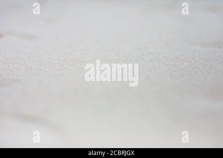 Sandstruktur, Nahaufnahme von etwas Sand am Ufer. Makrofoto von Stockfoto