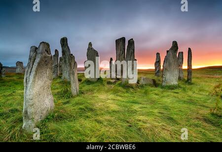 Stürmischer Sonnenuntergang über den Callanish Stones auf der Isle of Lewis in den Äußeren Hebriden von Schottland Stockfoto