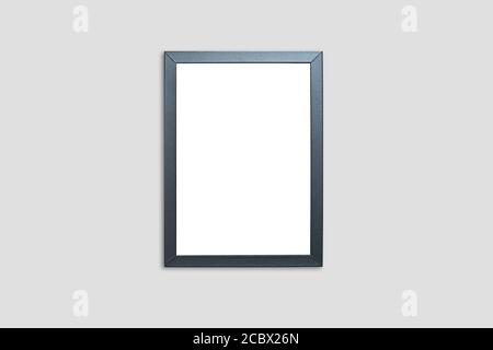 Leerer Fotorahmen an der Wand. Schwarzer rechteckiger Mockup-Rahmen für Ihre Präsentation Stockfoto