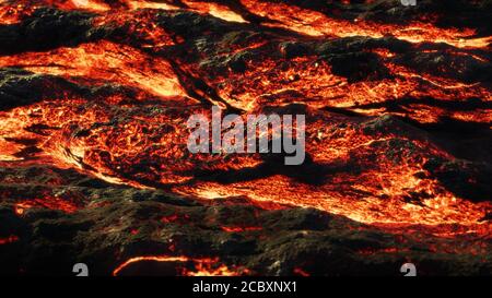 Lavafeld, heißer Magmafluss, geschmolzene Landschaft Stockfoto