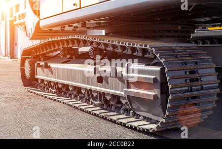 Neue Raupenbagger, Nahaufnahme, Hintergrund Industrie Stockfoto