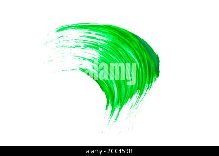 Grüner Acryl-Pinselstrich auf weißem Hintergrund. Stockfoto
