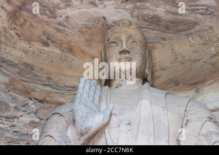Buddha-Denkmal aus Stein in der Höhle in Datong China Stockfoto