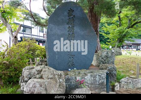 Iwate, Japan - Benkei Grab am Chusonji Tempel in Hiraizumi, Iwate, Japan. Es wurde als besondere historische Stätte bezeichnet. Stockfoto