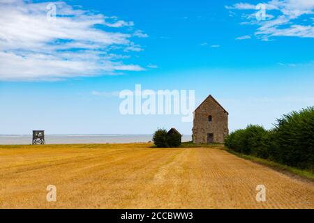 Die Kapelle St. Peter-on-the-Wall, Bradwell-on-Sea, Essex, ist ein denkmalgeschütztes Gebäude und gehört zu den ältesten intakten christlichen Kirchen in England. Stockfoto