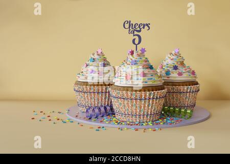 3d-Rendering von Jubiläums-Cupcakes auf einer Marmorplatte Stockfoto