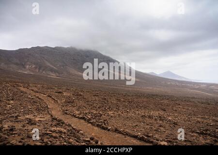 Die felsigen Wüsten-Weiten des südwestlichen Teils der Halbinsel Jandia. Fuerteventura Kanarische Inseln. Spanien. Stockfoto