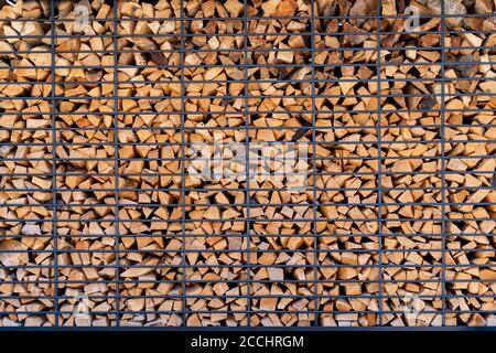 Nahaufnahme von ordentlich gestapelten Stapel von Feuer Holz gut für Hintergrundtextur oder Tapeten Bildschirmschoner. Stockfoto