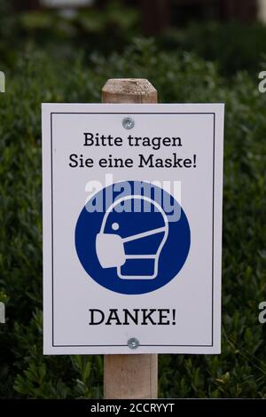 Bitte tragen Sie eine Maske! Vielen Dank! Stockfoto