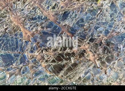 Zerbrochener Glashintergrund. Gebrochene Textur. Stockfoto