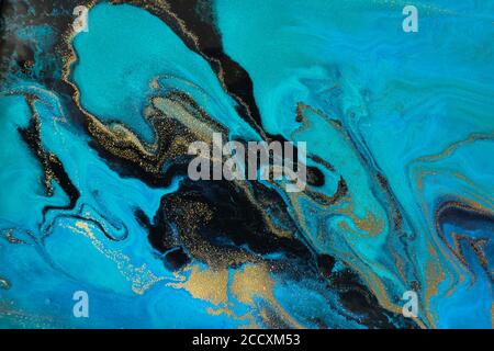 Marmorierte blaue und schwarze Ozeanmuster. Flüssiges Marmorpapier. Stockfoto