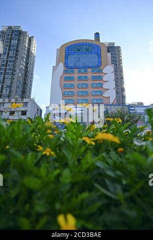 Luftaufnahme des 11-stöckigen 'Handy-Gebäudes' im Stil eines großen Bruders, das war Erbaut in den 1990er Jahren als Einkaufszentrum mit mobilen Telefone und Mob Stockfoto