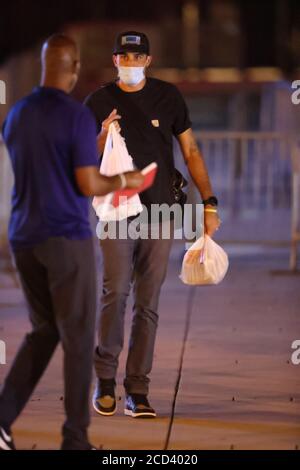 Washington, DC, USA. August 2020. Mitglieder der Major League Baseball Philadelphia Phillies verlassen Nationals Park nach ihrem Verlust gegen die Washington Nationals während der Pandemie-verkürzten Saison Covid-19 am 25. August 2020. Kredit: Mpi34/Media Punch/Alamy Live Nachrichten Stockfoto