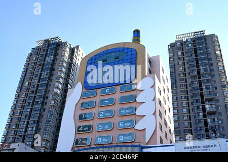 Luftaufnahme des 11-stöckigen 'Handy-Gebäudes' im Stil eines großen Bruders, das war Erbaut in den 1990er Jahren als Einkaufszentrum mit mobilen Telefone und Mob Stockfoto