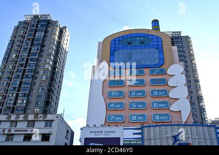 Luftaufnahme des 11-stöckigen 'Handy-Gebäudes' im Stil eines großen Bruders, das war Erbaut in den 1990er Jahren als Einkaufszentrum mit mobilen Telefone und Mob Stockfoto