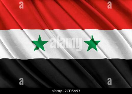 Bunte syrische Flagge winkt im Wind. Stockfoto