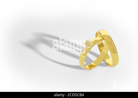 Paar goldene und diamantene Eheringe isoliert auf weißem Hintergrund. 3d-Illustration. Stockfoto