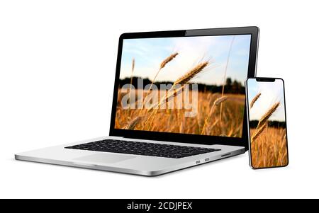 Moderner Laptop-Computer mit Smartphone isoliert auf weiß Stockfoto