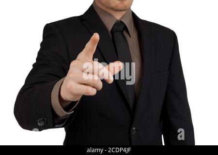 Porträt eines Geschäftsmannes, der mit dem Finger auf den Betrachter zeigt Stockfoto