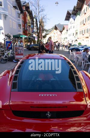 Kitzbühel, Austria - 30.09.2018: A red Ferrari parked in the street Stockfoto