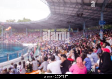 Verschwommene Personen Sportsitze Stockfoto