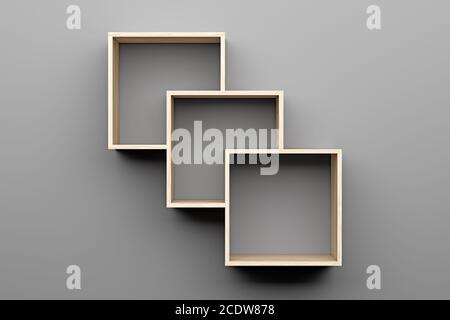 Leere Holzregale an der grauen Wand mit Licht von der Oben Stockfoto