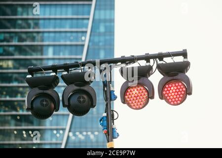 modern diode laser lighting system on a background with steel and glass skyscraper Stockfoto