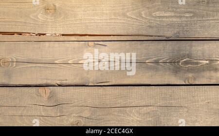 Natürliche Textur Hintergrund unbearbeitetes Holz sonniges Wetter im Freien Stockfoto