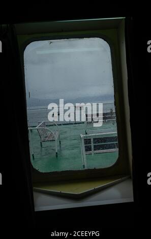 Patagonische Fähre Fenster in einem Sturm Stockfoto