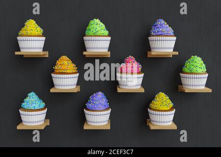 3D-Rendering von Farbe Cupcakes auf Regalen, jeder Cupcake hat weißen Cupcake und Farbe Schlagsahne, schwarzen Hintergrund Stockfoto