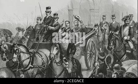 Spanien, Extremadura, Cáceres. König Alfonso XII. Von Spanien (1857-1885) und König Luis I. von Portugal (1838-1889) anlässlich der Einweihung der Eisenbahnlinie Madrid-Lissabon, 8. Oktober 1881. Eingang in die Stadt der beiden Monarchen. Komposition und Lebenszeichnung von Comba. Gravur von Vela. La Ilustracion Española y Americana, 1881. Stockfoto