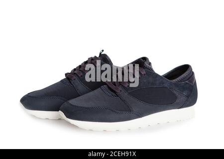 Neue Leder Sneakers isoliert auf weißem Hintergrund. Ein Paar Schuhe Stockfoto