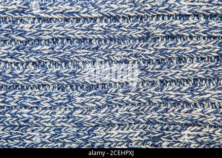 Farbe melange gewebte Faden Pullover oder Schal als Hintergrund. Gerippte Wollstruktur Stockfoto