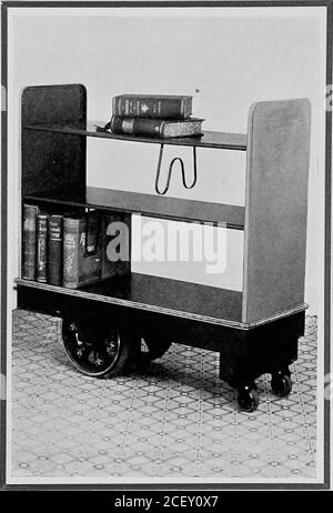 . Metallische Bücherstapel und Möbel für Bibliotheken; metallische Akteneinlagen und Möbel für Gewölbe und Büros. 53 :leta]IicLibraryTruck. Metallic Periodica] Rack. Stockfoto