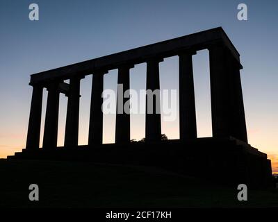 Sunrise, National Monument of Scotland, Calton Hill, Edinburgh, Schottland, Großbritannien, GB. Stockfoto