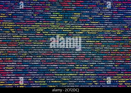 Entwickler-Bildschirm mit farbigen Website-Programmiercode, PHP und Javascript Stockfoto