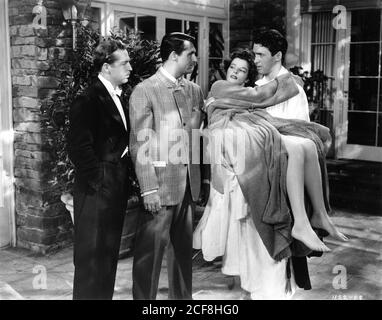 JOHN HOWARD CARY GRANT KATHARINE HEPBURN UND JAMES STEWART IN DIE GESCHICHTE VON PHILADELPHIA 1940 Regisseur GEORGE CUKOR spielt Philip Barry Drehbuch Donald Ogden Stewart Gowns von Gilbert Adrian Metro Goldwyn Mayer Stockfoto