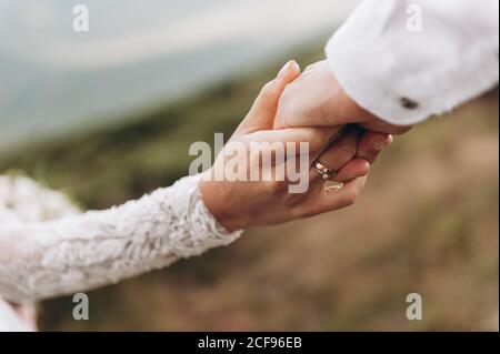 Hochzeitsthema, halten Hände Brautpaar Stockfoto