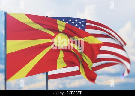 Winkende amerikanische Flagge und Flagge von Nord-Mazedonien. Nahaufnahme, 3D-Illustration. Stockfoto