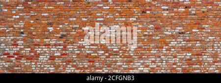 Rote Backsteinwand breites Banner. Hintergrund für die Konstruktion. Stockfoto