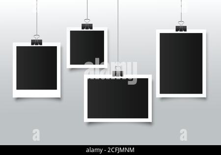 Leerer Bilderrahmen, der an einem Clip hängt. Schwarzer leerer Platz für Ihren Text oder Ihr Foto. Realistische detaillierte Foto Symbol Design Vorlage. Vektor Stock Vektor
