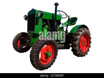 Alter Traktor isoliert auf weiß Stockfoto