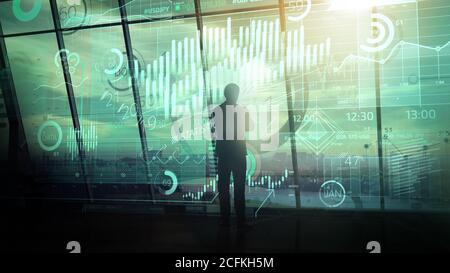 Geschäftsmann arbeitet mit Big Data in einem dunklen Büro. Stockfoto