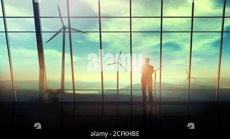 In einem geräumigen Büro vor dem Fenster schaut ein Mann auf Windparks. Stockfoto