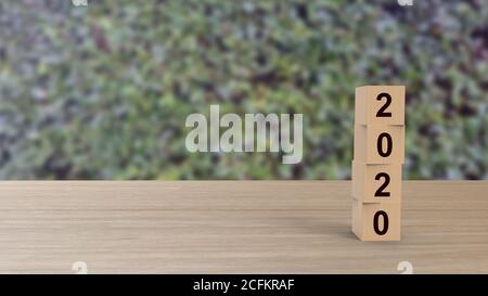 2020 Zahlen Wort Holzwürfel auf Tisch vertikal über Hintergrund Blätter grün HD, Mock up, Vorlage, Banner mit Platz für Text kopieren, Happy New Year d Stockfoto