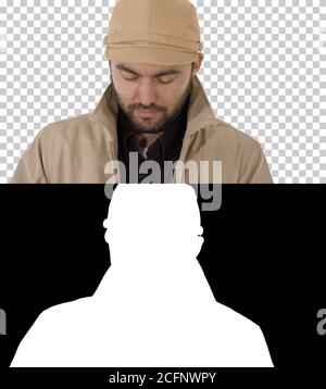 Gesicht eines Mannes im Graben Blick auf sein Smartphone, Alpha Channel Stockfoto