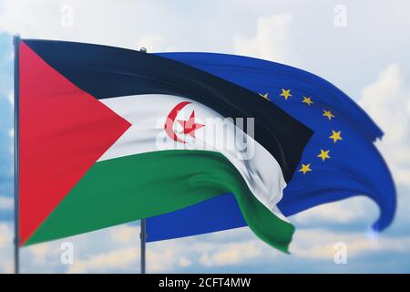 Flagge der Europäischen Union und Flagge der Arabischen Demokratischen Republik Sahraui schwenken. Nahaufnahme, 3D-Illustration. Stockfoto